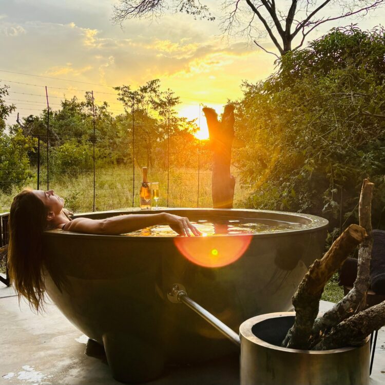 Hot Tub Sunset and Lady relaxing in the African Bush